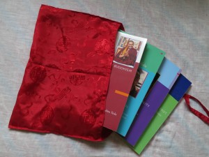 Carrying only wrapped Dharma Books Carrying only wrapped Dharma Books