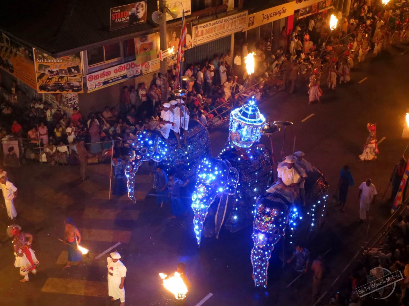 Lit-up Elephants at Esala Perahera Festival in Kandy, Sri Lanka Lit-up Elephants at Esala Perahera Festival in Kandy, Sri Lanka