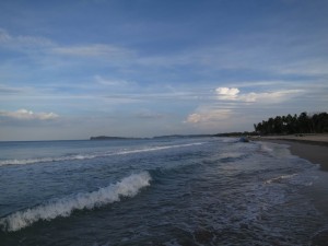 Evening Swim at Uppuveli Beach in Trincomalee, Sri Lanka Evening Swim at Uppuveli Beach in Trincomalee, Sri Lanka