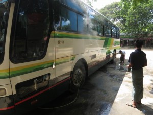 Cooling the Brakes of the Mandalay Bus, Myanmar Cooling the Brakes of the Mandalay Bus, Myanmar