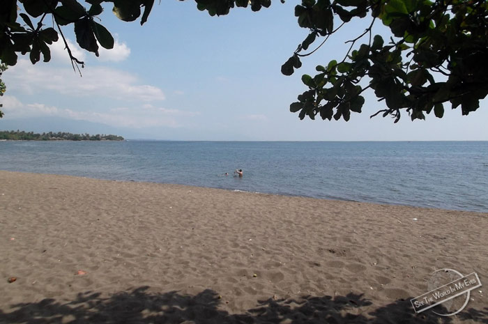 Grey Sand Tourist Beach of Lovina, in the North of Bali, Indonesia Grey Sand Tourist Beach of Lovina, in the North of Bali, Indonesia