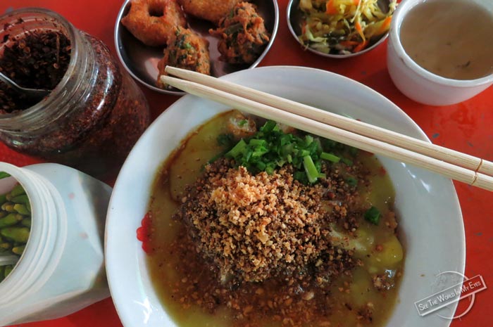 Liquid Tofu Noodles with Peanuts and Fried Toppings in Myanmar Liquid Tofu Noodles with Peanuts and Fried Toppings in Myanmar