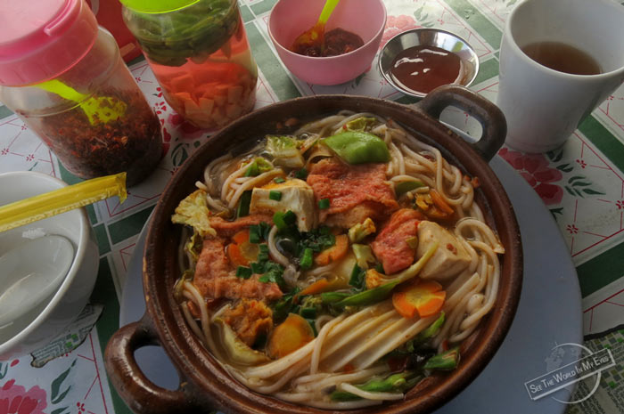 Big Stone Pot of Special Shan Noodle Soup with Tofu in Kalaw, Myanmar Big Stone Pot of Special Shan Noodle Soup with Tofu in Kalaw, Myanmar