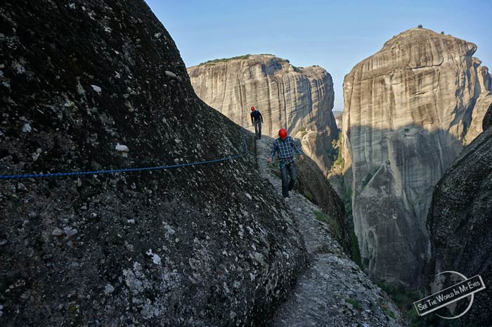 Via Ferrata style Hiking with Lanyard on the Edge of the Cliffs in Metora, Greece