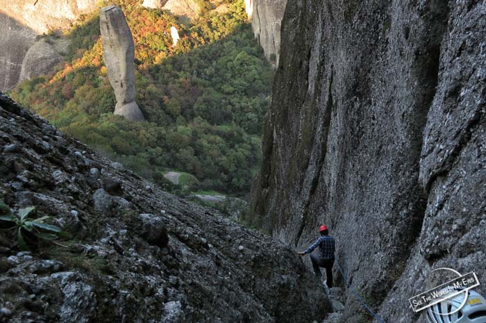 Climbing back down in the Gap of the Cliffs at Great Saint in Meteora, Greece